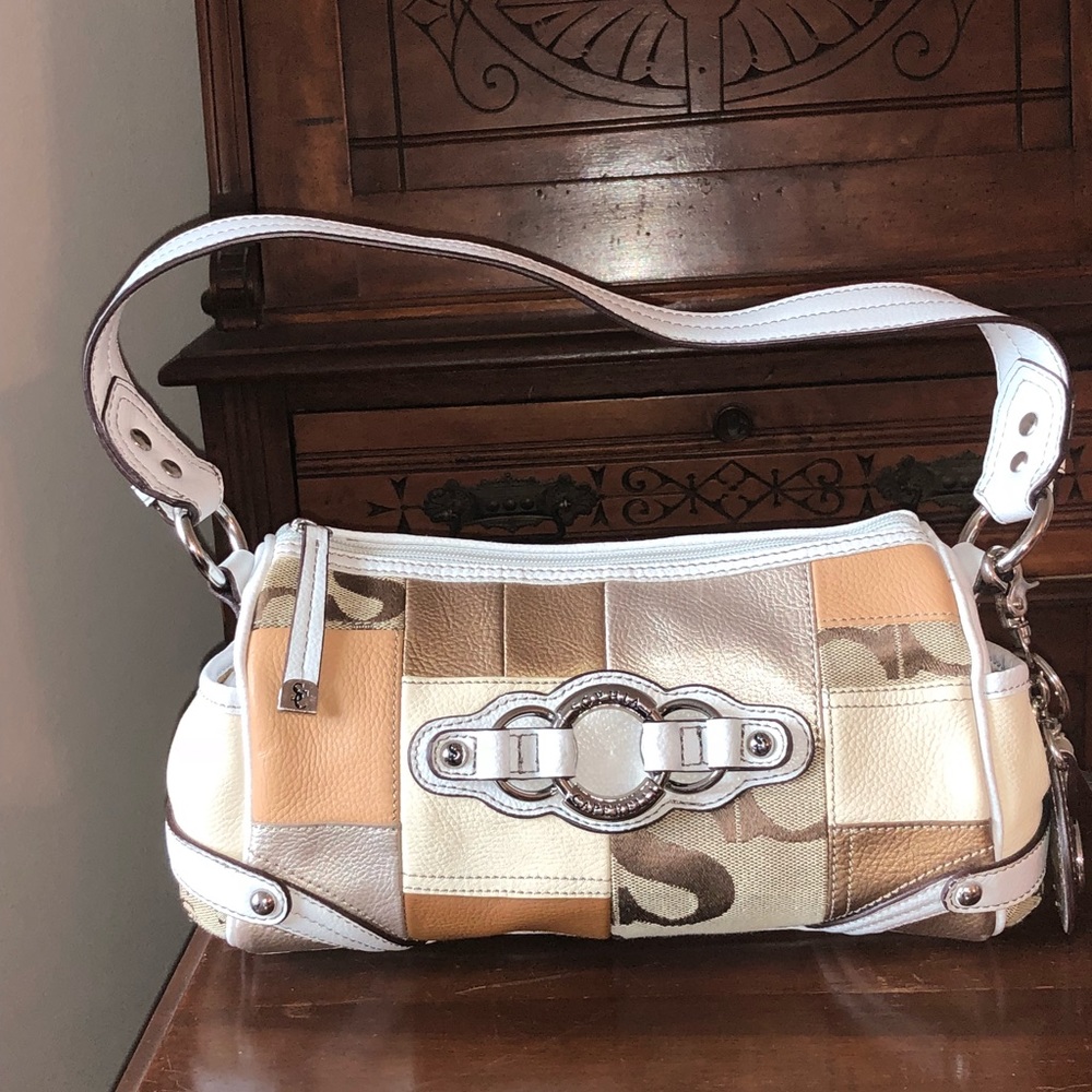 Leather Sophia Caperelli hand bag. NWOT